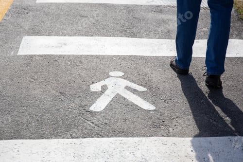Preview: Pedestrian sign on the asphalt