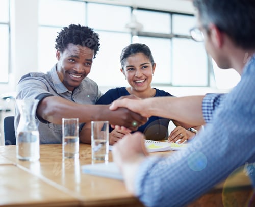 Preview: Im impressed. Shot of two businessmen shaking hands in a meeting.