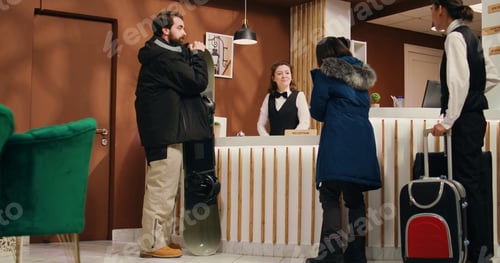 Preview: Active people enter alpine resort lobby
