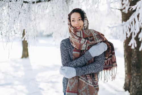 Preview: A portrait of a girl with a beautiful smile in the winter, snowly and sunny day on the outdoors.