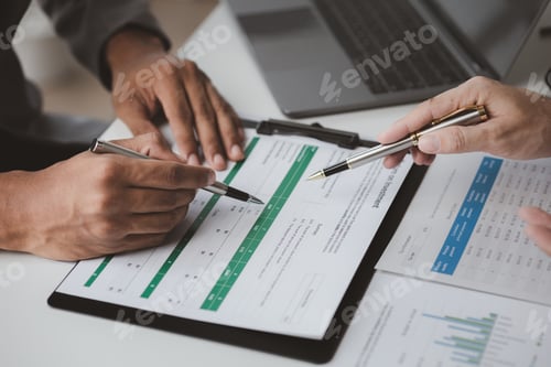 Preview: Executives and managers are meeting in a conference room, on the table there are some documents abou