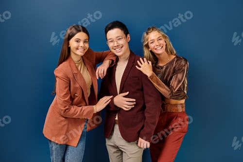 Preview: joyous multicultural fashionable teens in elegant attires smiling at camera, friendship day