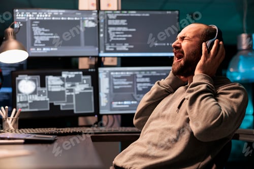 Preview: Funny programmer screaming and listening to music