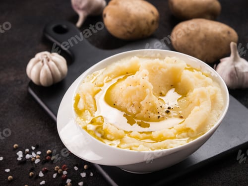 Preview: Mashed potatoes on dark concrete background