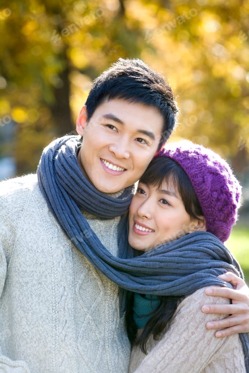 Preview: Young Couple Wrapped in a Scarf