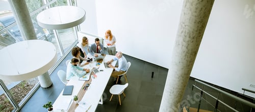 Preview: Top view at business people in office