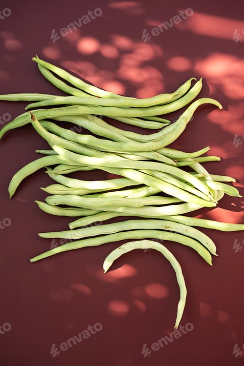 Preview: Some string beans on garden table. Home grown organic veggies.