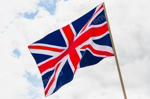 Preview: national flag of united kingdom with red cross against sky