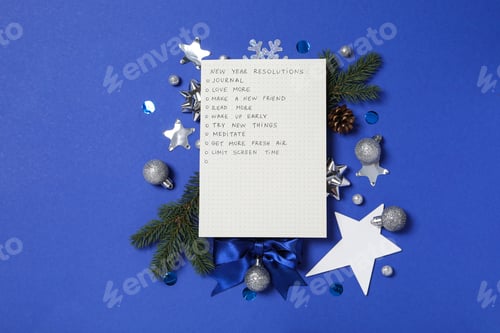 Preview: Paper with list and decorations on blue background, top view