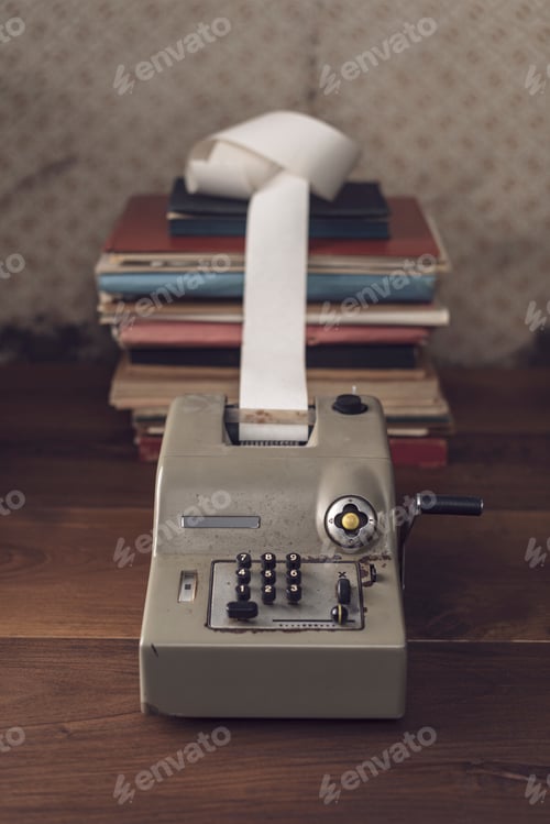 Preview: Vintage calculator on the accountant desk