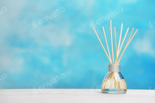 Preview: Aromatic reed freshener on table against color background