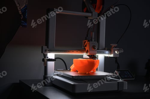 Preview: 3D Printer Creating Orange Plastic Object on Platform