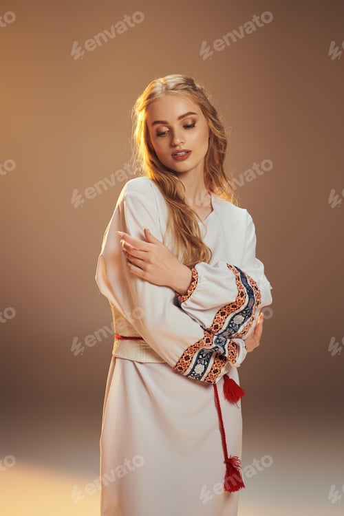 Preview: Serene fairy maiden in white dress with red tassel