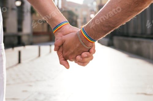 Preview: Sunset Silhouette: Intertwined Hands of Anonymous Men Strolling Down Sunny City Streets"