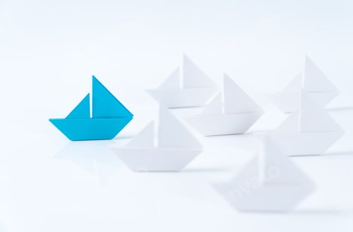 Preview: Leadership conceptual using blue paper ship