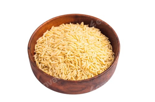 Preview: Raw Orzo pasta, uncooked dry Italian risoni in a bowl isolated on white background. top view