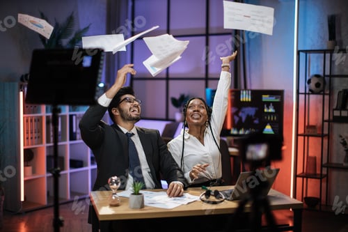 Preview: Overjoyed multiracial business people, african businesswoman and indian broker getting good news