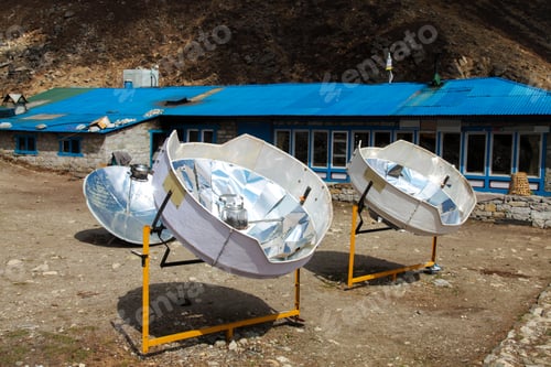 Preview: Warming the teapot in a solar cooker. Nepal. Himalaya