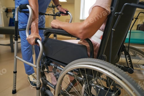Preview: Stroke woman uses walker for support in rehab center