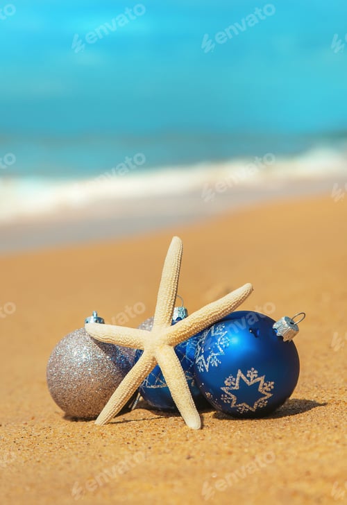 Preview: Christmas Ornaments and Starfish on a Sandy Beach