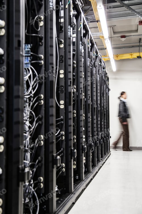 Preview: An aisle of racks in a computer server farm.