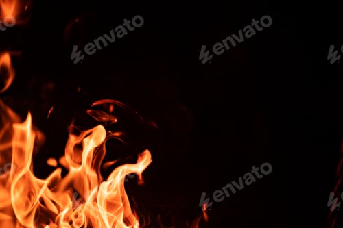 Preview: Campfire flame isolated on black background