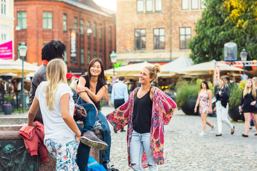 Preview: Friends hanging out in town square