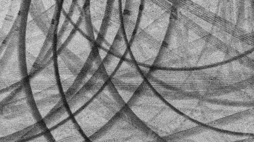 Preview: Aerial view tire track mark on asphalt tarmac road race track texture and background.