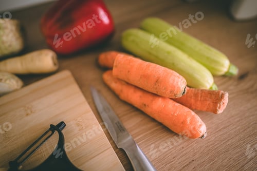 Preview: Bright Raw Vegetables on Wooden Cutting Board