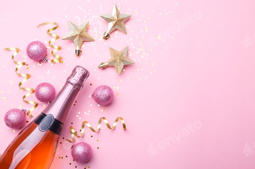 Preview: Champagne bottle and golden Christmas decorations