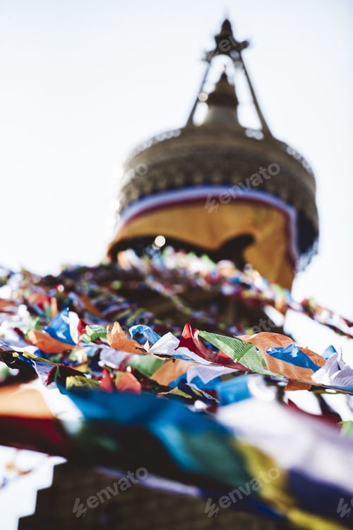 Preview: Vertical closeup shot of cloths attached to a rope with a blurred background