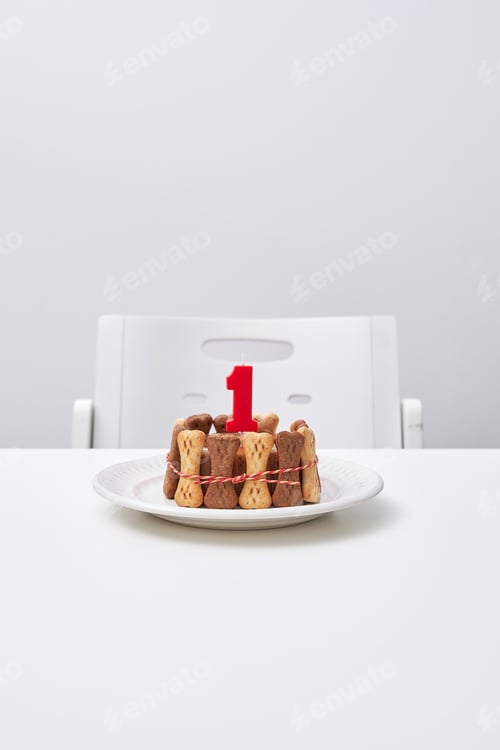 Preview: Delicious cake with candle on table