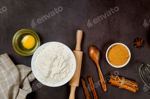 Preview: Top view of ingredients bakery making on dark old table