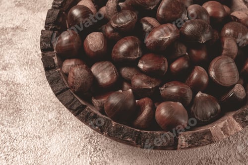 Preview: fresh chestnuts, in a wooden bowl, top view, no people,