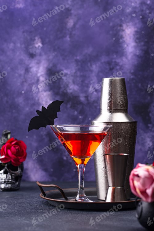 Preview: Halloween martini cocktail on purple background