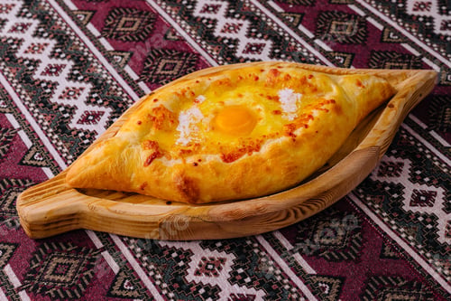 Preview: Traditional georgian khachapuri on wooden board