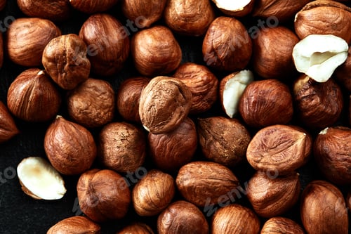 Preview: Close up of Hazelnut kernels - Food Frame Background, macro detailed close up.