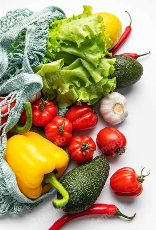 Preview: Fresh vegetables in string bag for healthy eating