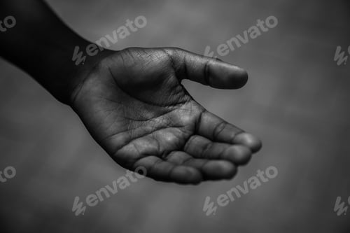 Preview: Grayscale closeup shot of a person's palm.