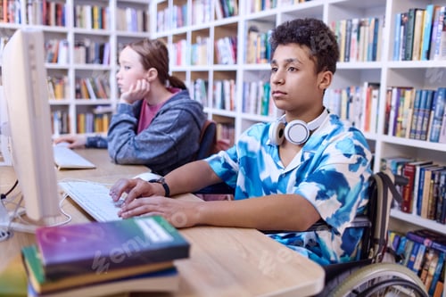 Preview: Boy using wheelchair in computer class