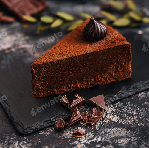 Preview: slice of tasty chocolate cake with chocolate sliced