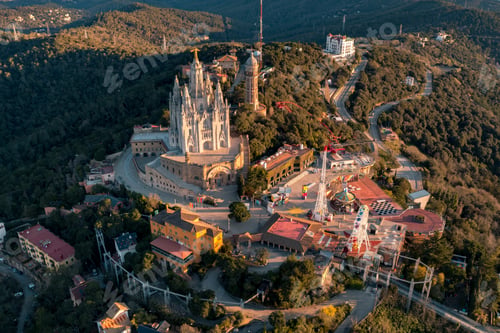 Preview: Aerial view of Barcelona skyline with Sagrat Cor temple during sunrise, Catalonia, Spain