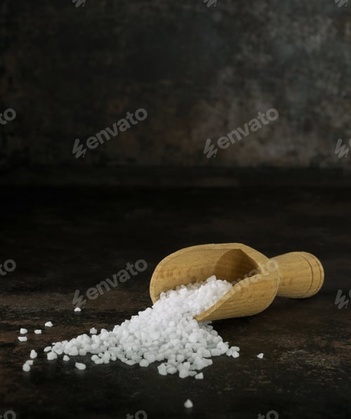 Preview: A wooden scoop of salt crystals