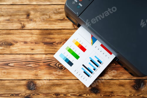 Preview: Modern laser printer with paper on wooden background