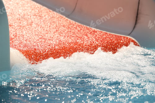 Preview: Wide slide at water park, closeup. Summer vacation