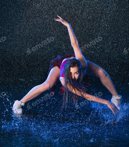 Preview: The Young Beautiful Modern Dancer Dancing Under Water Drops