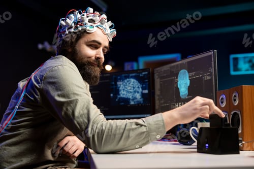 Vista previa: Un hombre con auriculares EEG inserta un disco en un PC que contiene un software que hace que la IA sea sensible