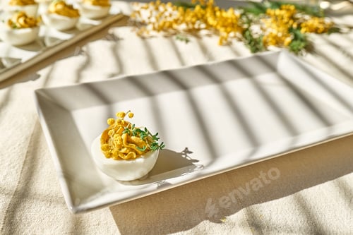 Preview: Stuffed easter eggs mimosa with egg yolk, turmeric, cream cheese and cress salad.