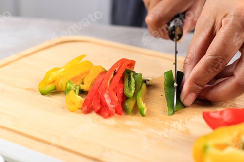 Preview: Pepper Cutting. Hands, Knife and Red, Green, Yellow Bell Peppers