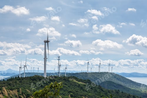 Preview: wind farm against a sunny sky
